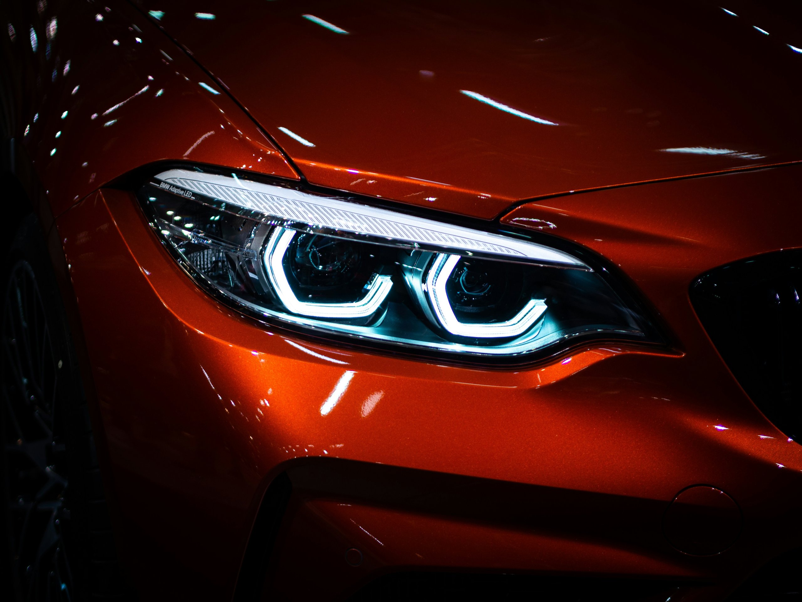 Restored car headlights improving nighttime visibility and vehicle appearance in Charlotte, NC